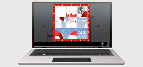 Laptop showing Santa's Advent Calendar App